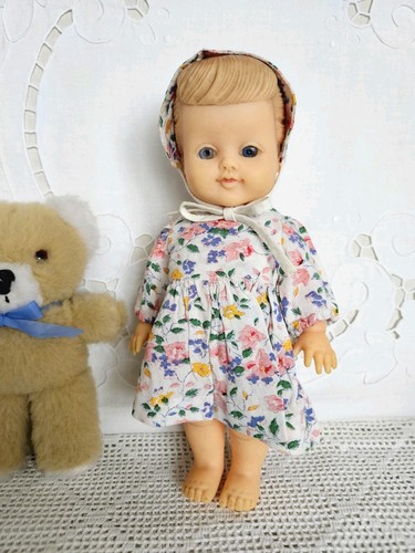 Pedigree doll with moulded - with,