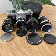 Yashica Reflex 35 SLR Film Camera With 4 Lenses 50mm, 35mm, 28mm, 135mm