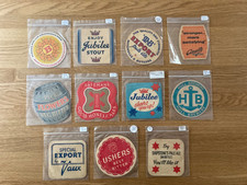 11 vintage British beer mats