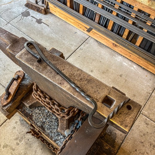 Hand forged fire - hand,