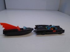 Husky/corgi Batman,s Batmobile Batboat