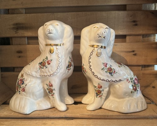Pair aged pottery flowers - of,