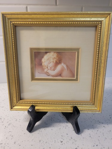 Cupid caught napping small - cupid,