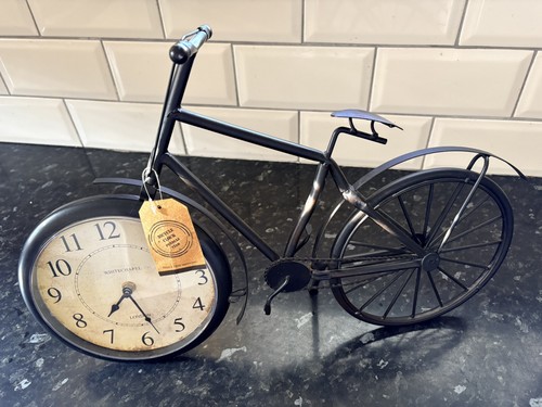 Antique bicycle clock