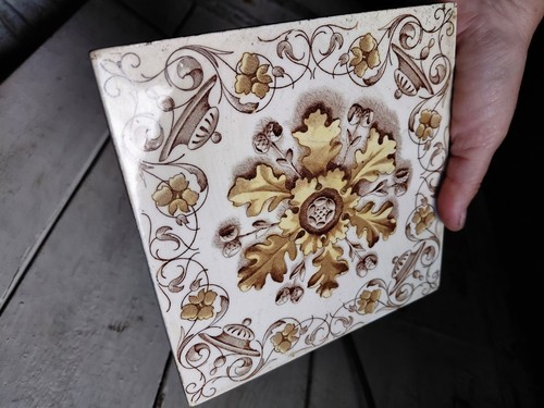 Old vintage tile - acorns, and