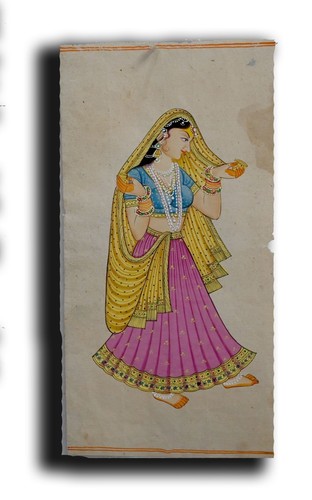 Maharani holding perfume - maharani,