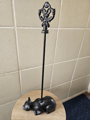 Vintage cast iron settled - settled, cat