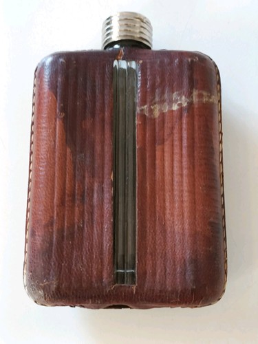 Vintage leather clad glass hip - clad,