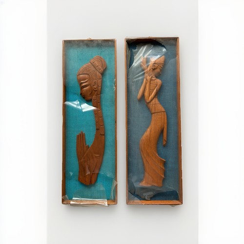 Pair framed carved teak - of,
