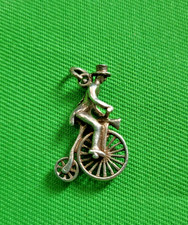 Vintage silver man riding