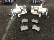 REAR BRAKE CALIPER LH RH +