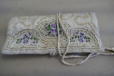 Beautiful jewellery roll wrap travel case.  Beaded and embroidered.  Cream