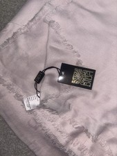 BIBA light pink logo letters