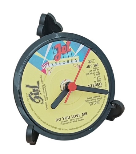 Girl clock side - side, desk