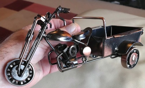 Scrap metal art nuts and - art,