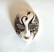Ceramic face mask, wall