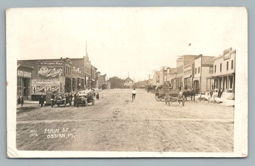 Main street ossian iowa rppc - street,