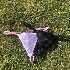 purple and pink and black strappy thong size small new and never worn