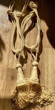 Gold coloured curtain tie backs - rope style with tassels - matching pair vgc 