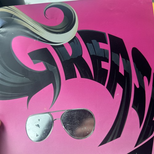Grease the word - -, dominion
