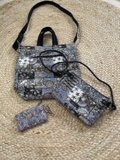 Collection of Sakroots Bags