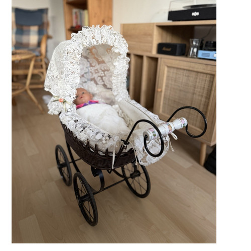 Vintage pram with porcelain