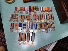 COLLECTION OF FORTY-SIX MINIATURE MEDALS.