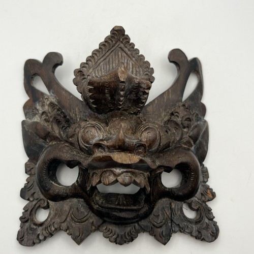 Hand carved wooden dragon - hand, face