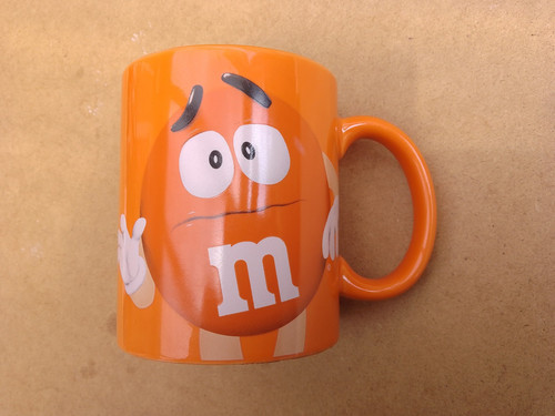 And orange mug - m,