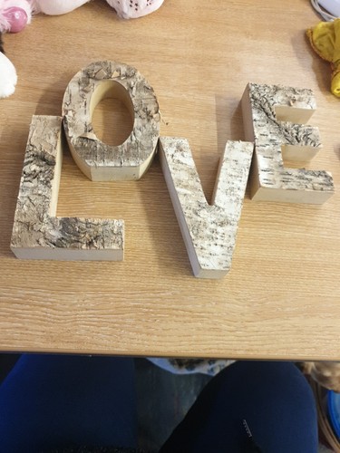Wooden letters spelling - wooden,