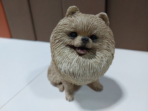 Stone critters pomeranian dog - stone,