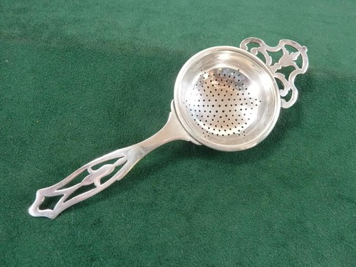 Nice vintage tea strainer - a,