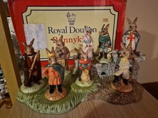 Royal Doulton Bunnykins 'The Robin Hood Collection. (Complete Set +Display Stand