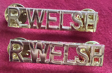 Pair of Royal Welsh British Military Brass Shoulder Titles - gilt metal