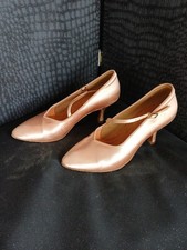 Peach women's ballroom or Latin dance shoe with a flared heel Size 5 wide.