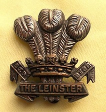 Bi-METAL IRISH LEINSTER REGIMENT CAP BADGE - C673