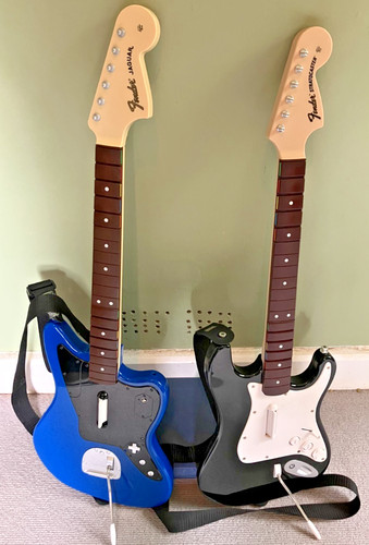 Two rock band guitars - two,