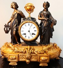 ANTIQUE FRENCH GILT FIGURAL MANTEL CLOCK & STAND.
