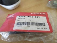 NOS HONDA REAR REFLECTOR
