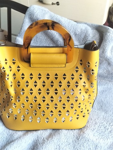 Mustard yellow bag with - bag,