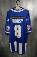 Signed Wigan Athletic