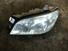 2004 Kia Sedona Passengers Side Headlight