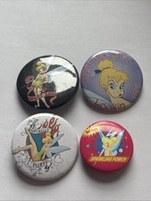 Four Tinker bell Pin Badges. 