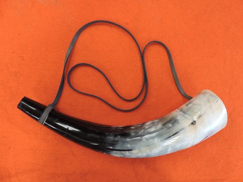 Viking blowing cow horn - blowing,