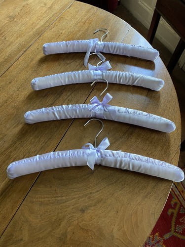 Four padded hangers - four,