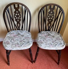 Pair of Priory vintage Windsor oak bow & spindle wheel back chairs + seat pads