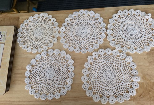 Round hand crocheted doily - hand,