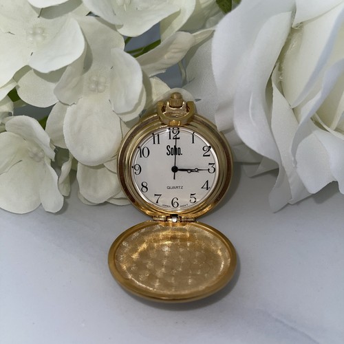 Soho gold tone quartz - tone,