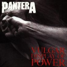 Vulgar display power by - display, of