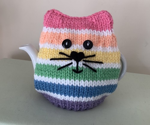 New hand knit white - hand, white/rainbow